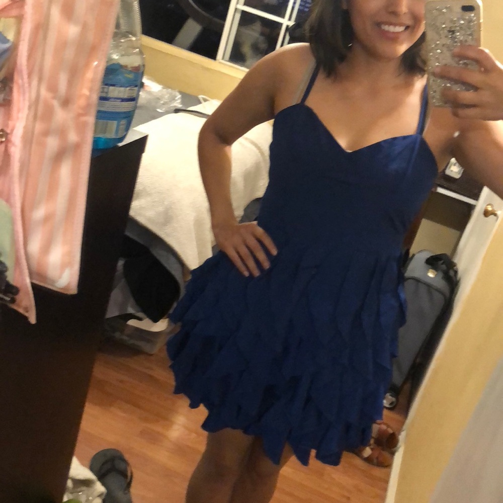 Blue dress with fun paneled strips on bottom